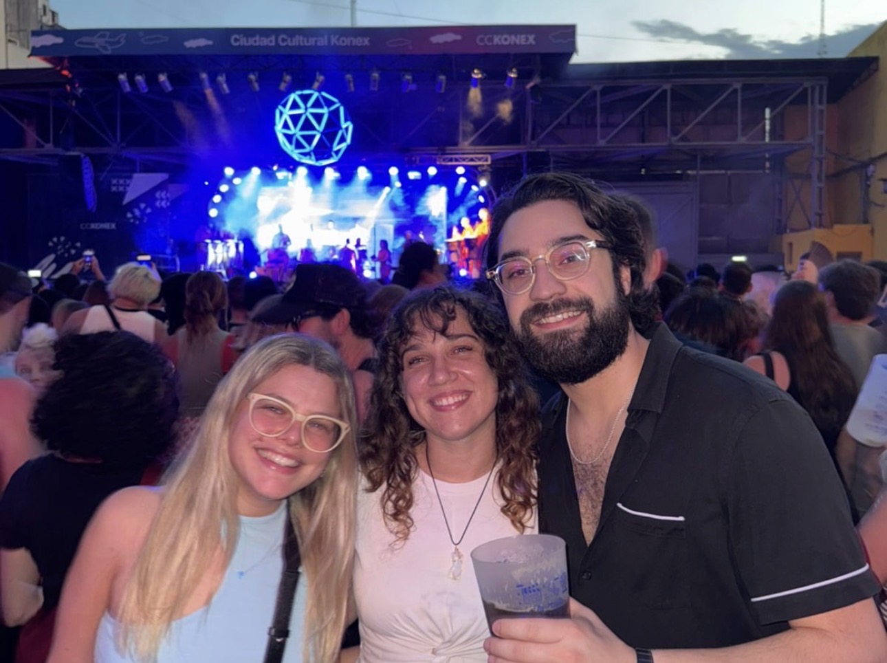 Mica, Alex, and a friend at a concert in Buenos Aires